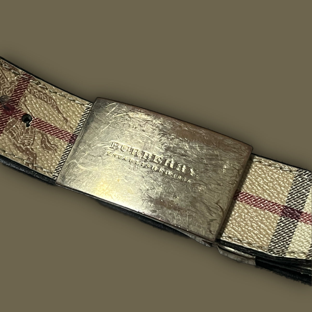 Burberry belt real vs fake hotsell