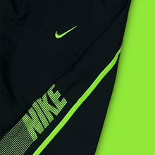 Load image into Gallery viewer, vintage Nike trackpants {S}
