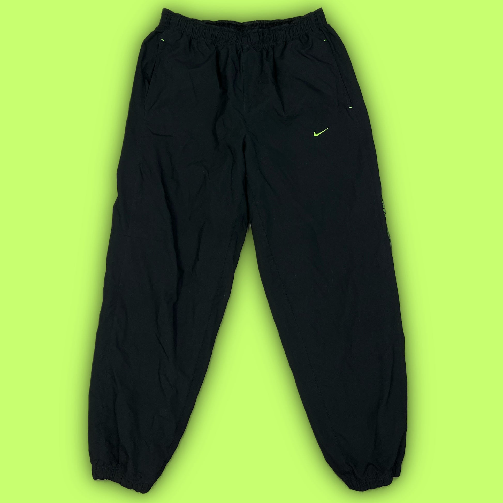 vintage Nike trackpants {L}