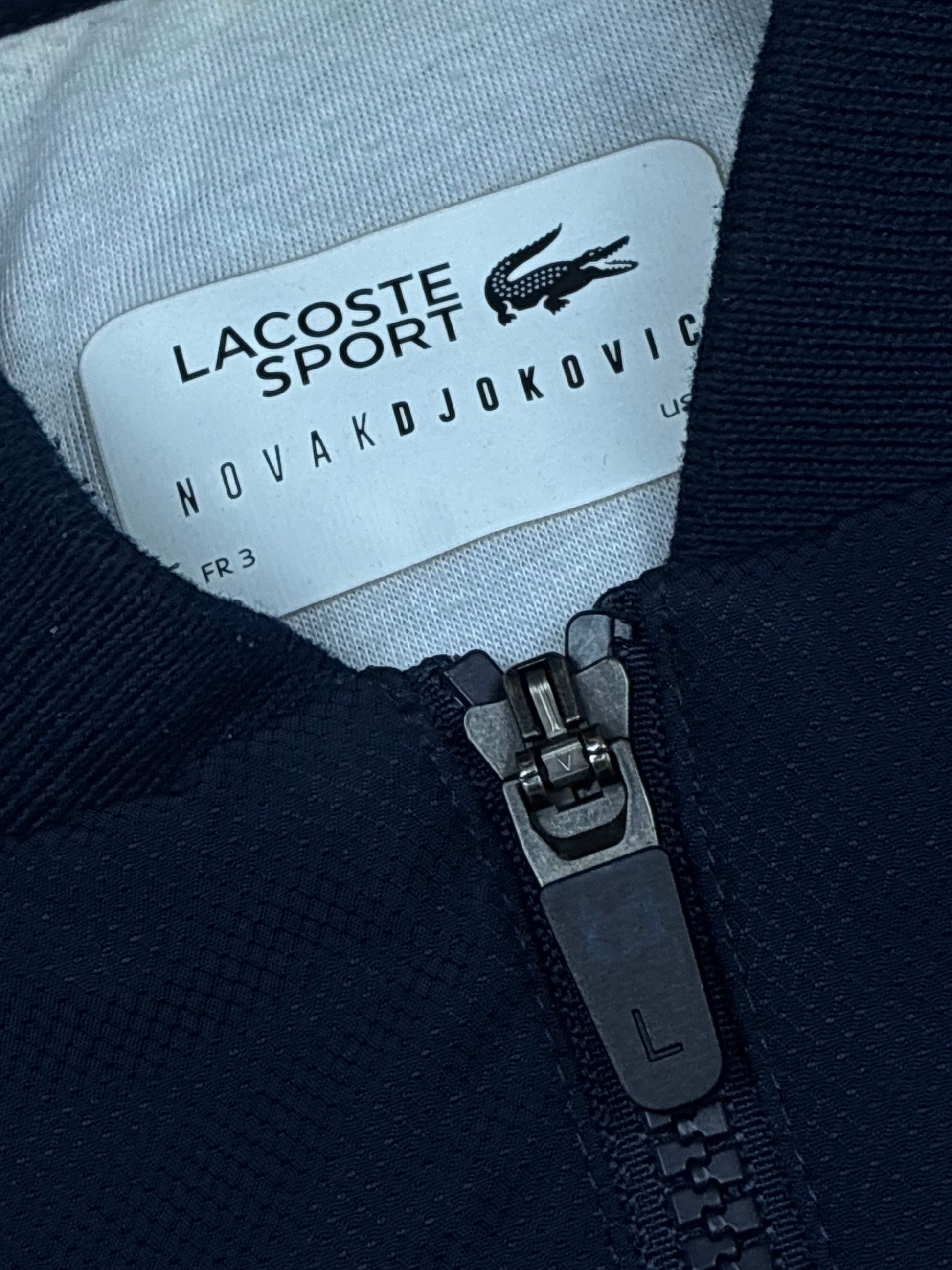 navyblue Lacoste windbreaker {S}