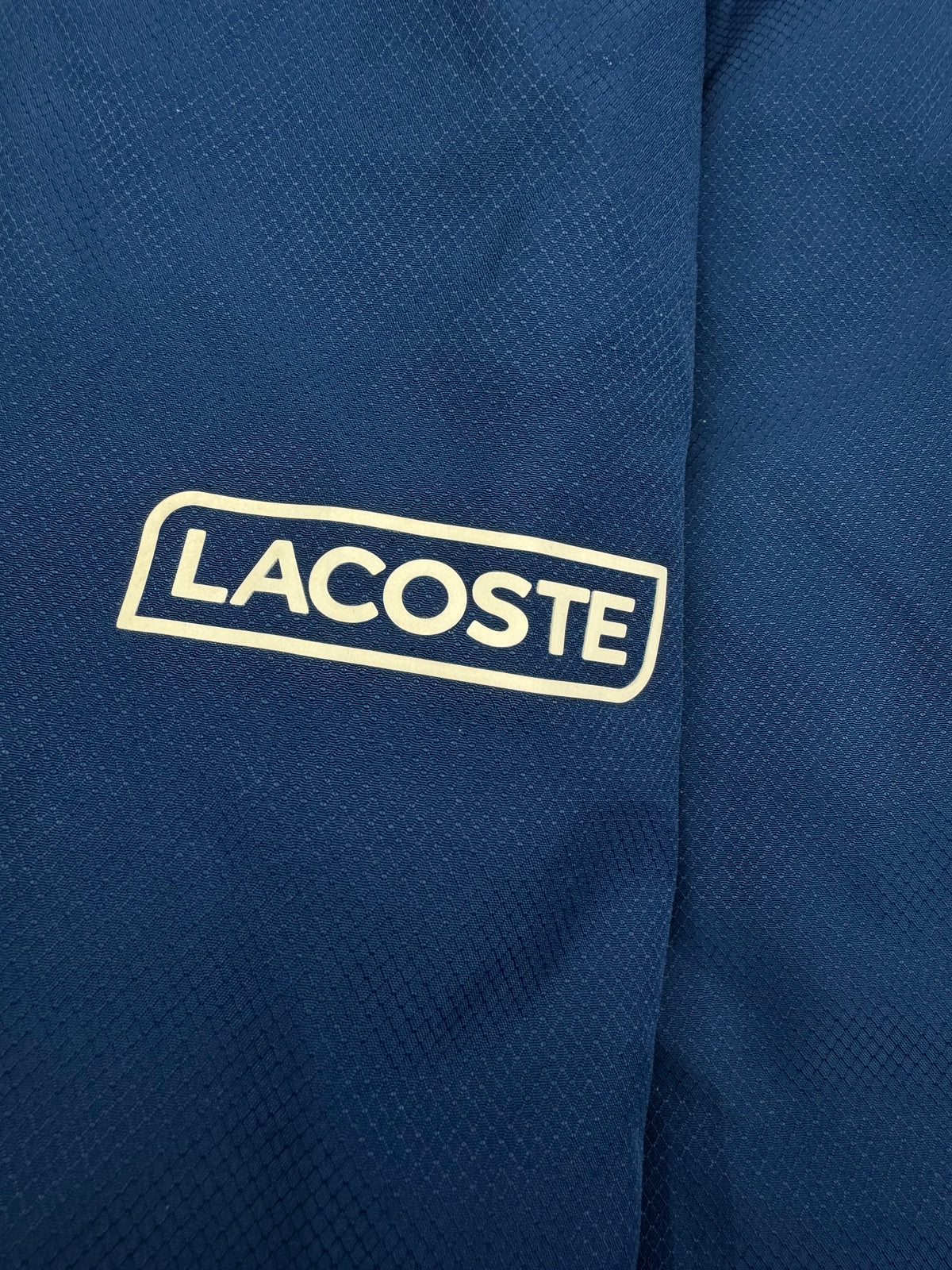 navyblue Lacoste windbreaker {S}