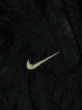 Load image into Gallery viewer, vintage Nike trackpants {L}
