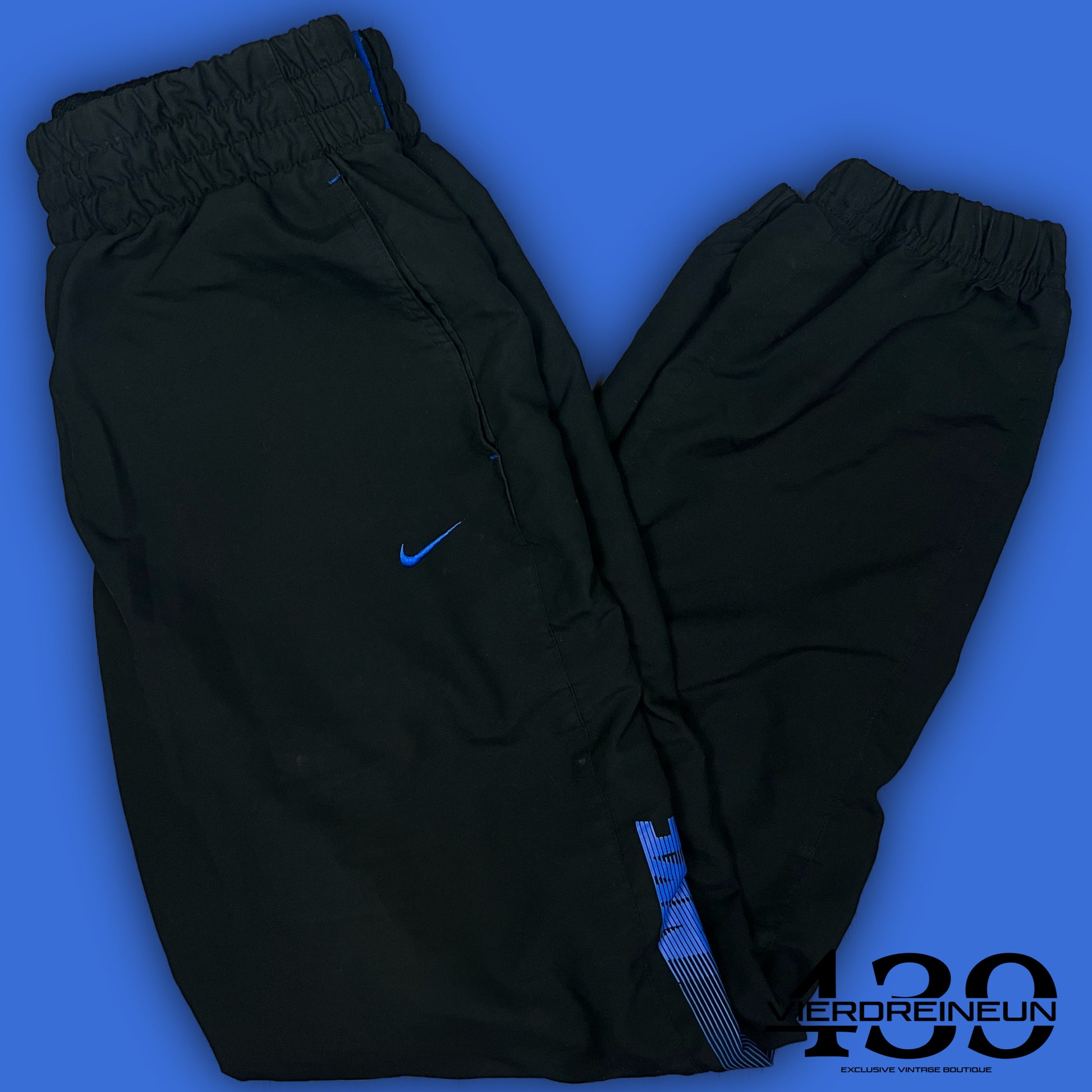 vintage Nike trackpants {M}