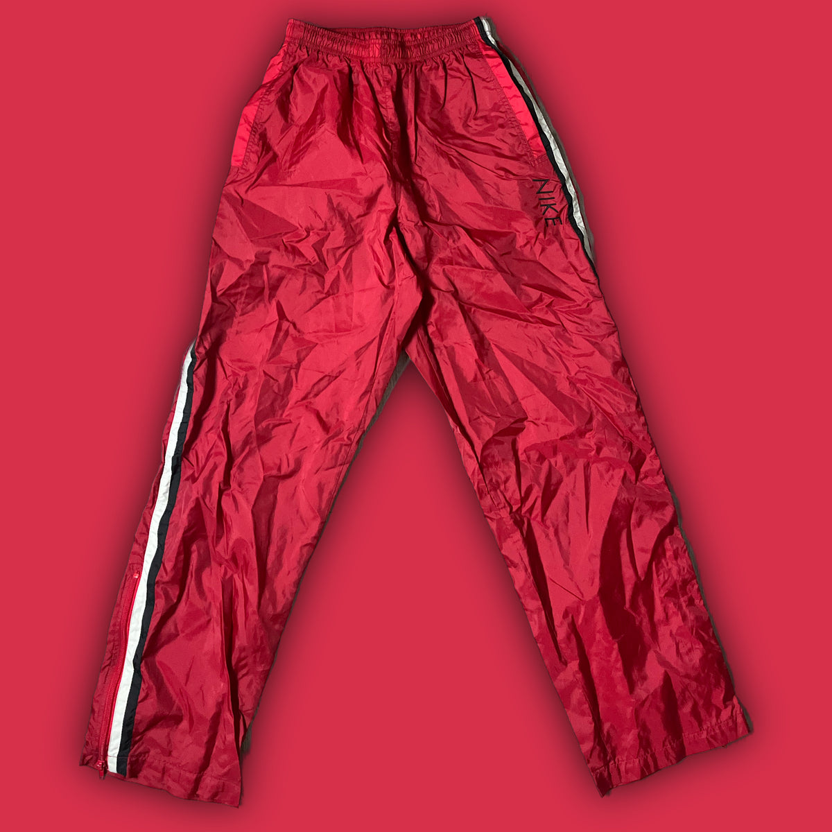 vintage Nike trackpants {S}