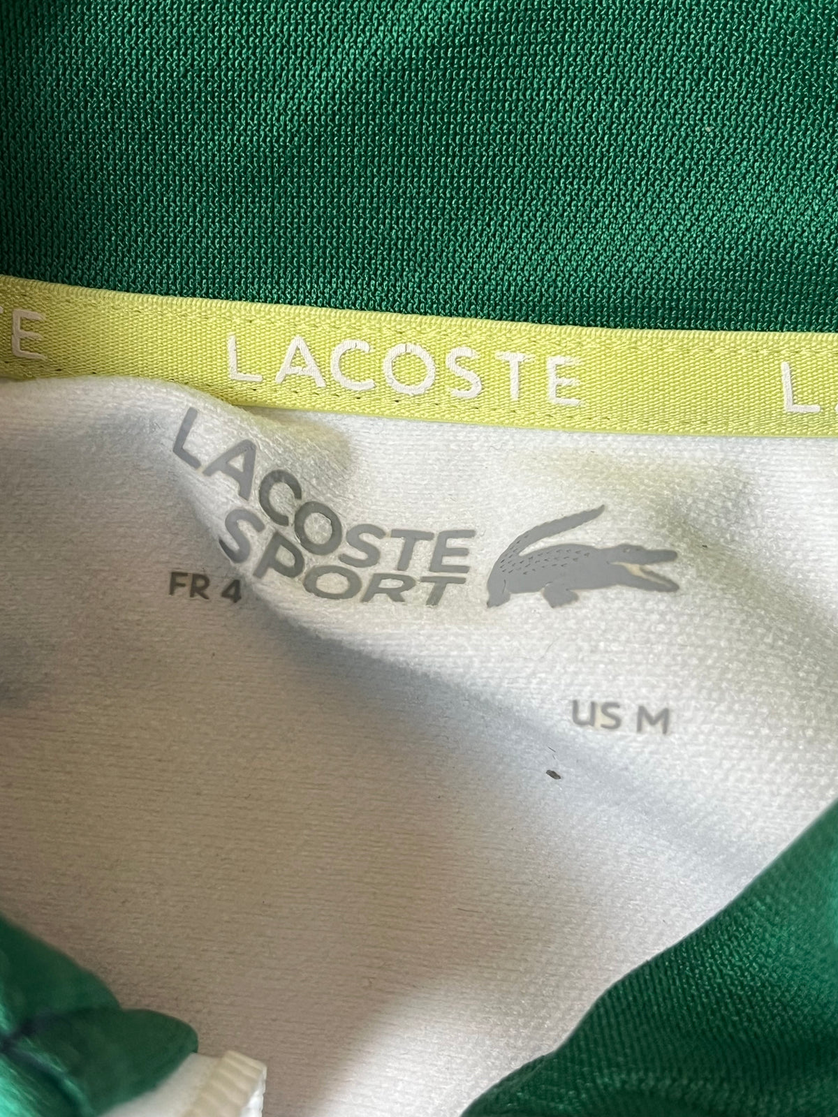 white Lacoste trackjacket {M}