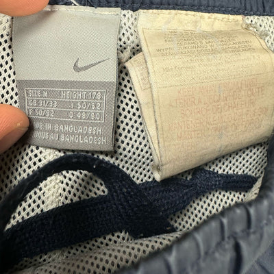 vintage Nike trackpants {M}