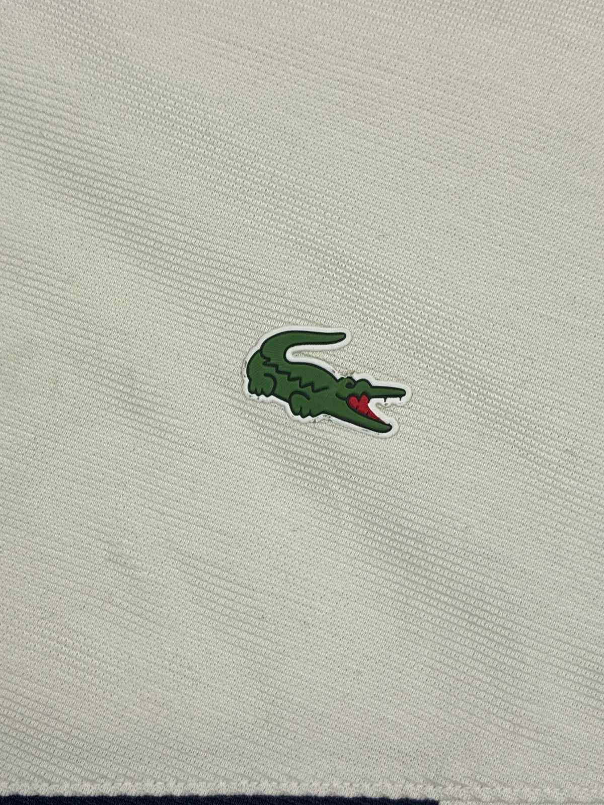 white Lacoste polo {M}