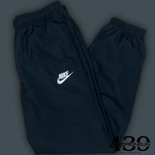 Carregar imagem no visualizador da galeria, vintage Nike trackpants {L}
