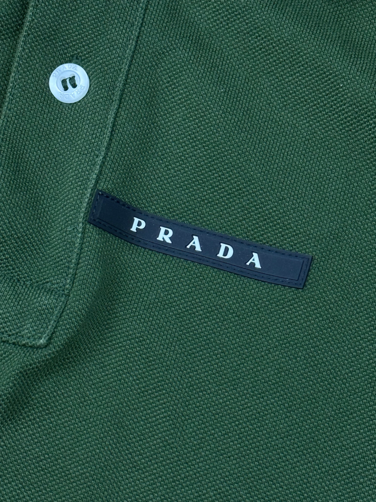 dark green Prada polo