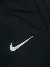 Load image into Gallery viewer, vintage Nike trackpants {M}
