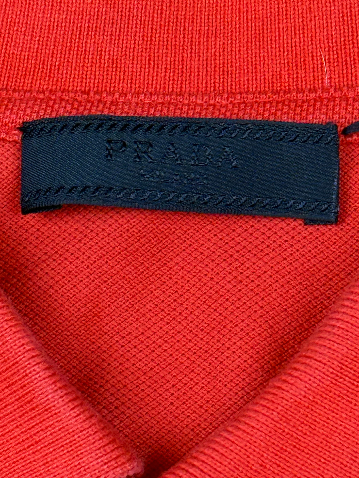 orange Prada polo