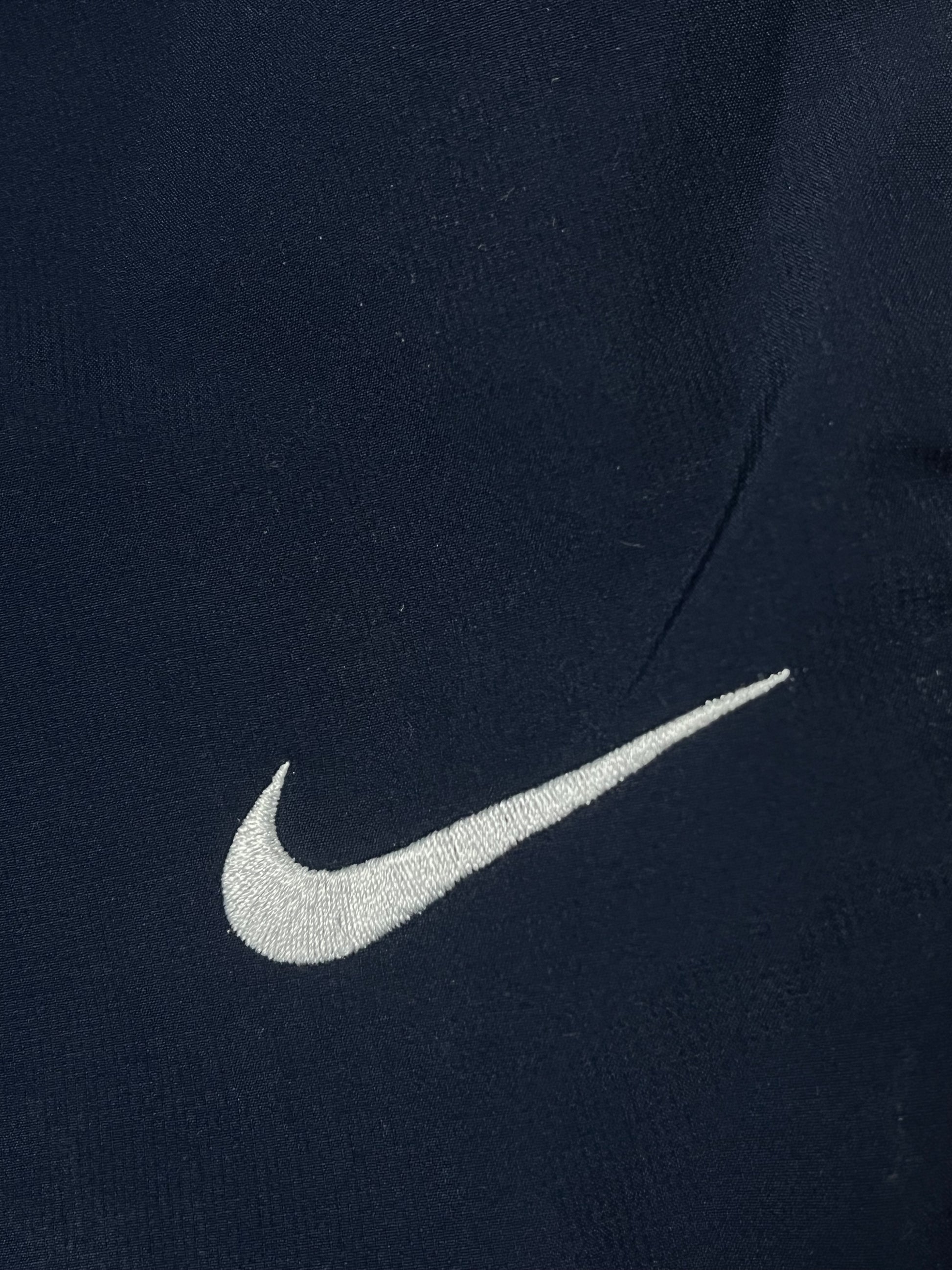 vintage Nike trackpants {L}