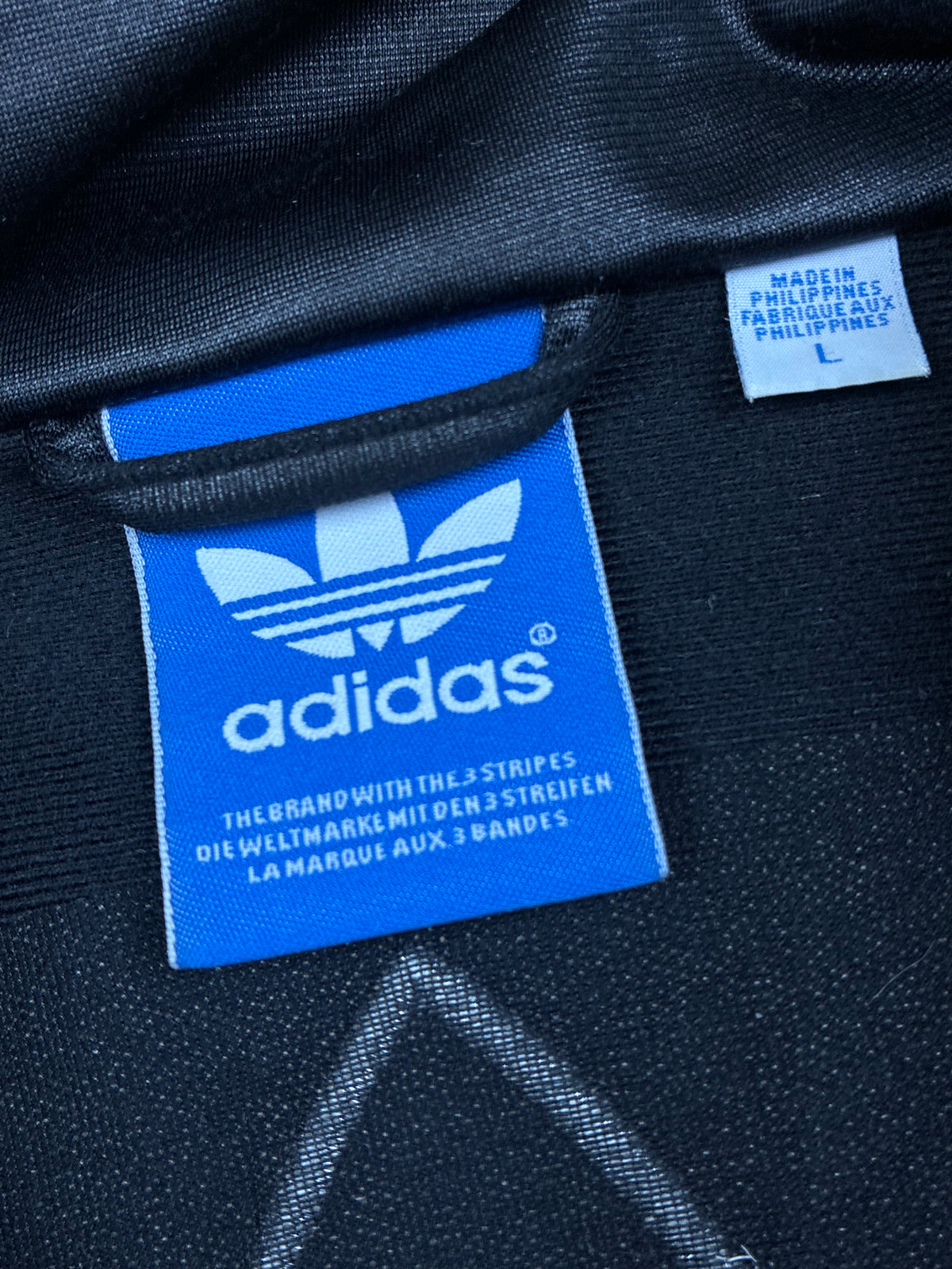 vintage Adidas firebird trackjacket wet look {L}