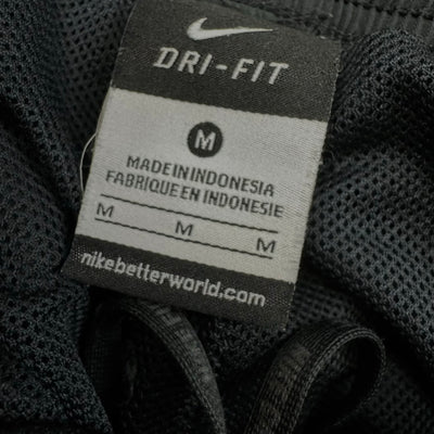 vintage Nike trackpants {M}