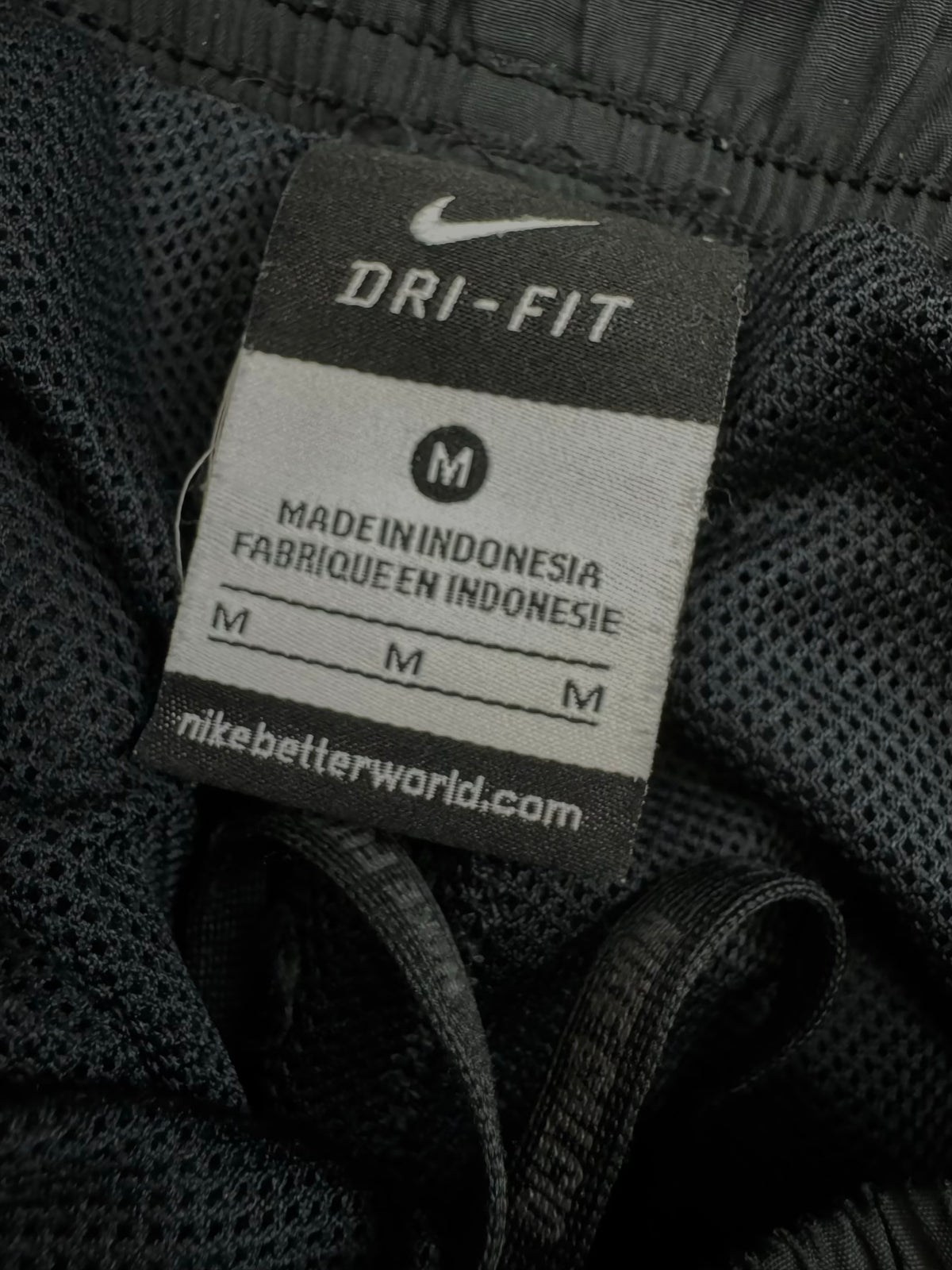 vintage Nike trackpants {M}