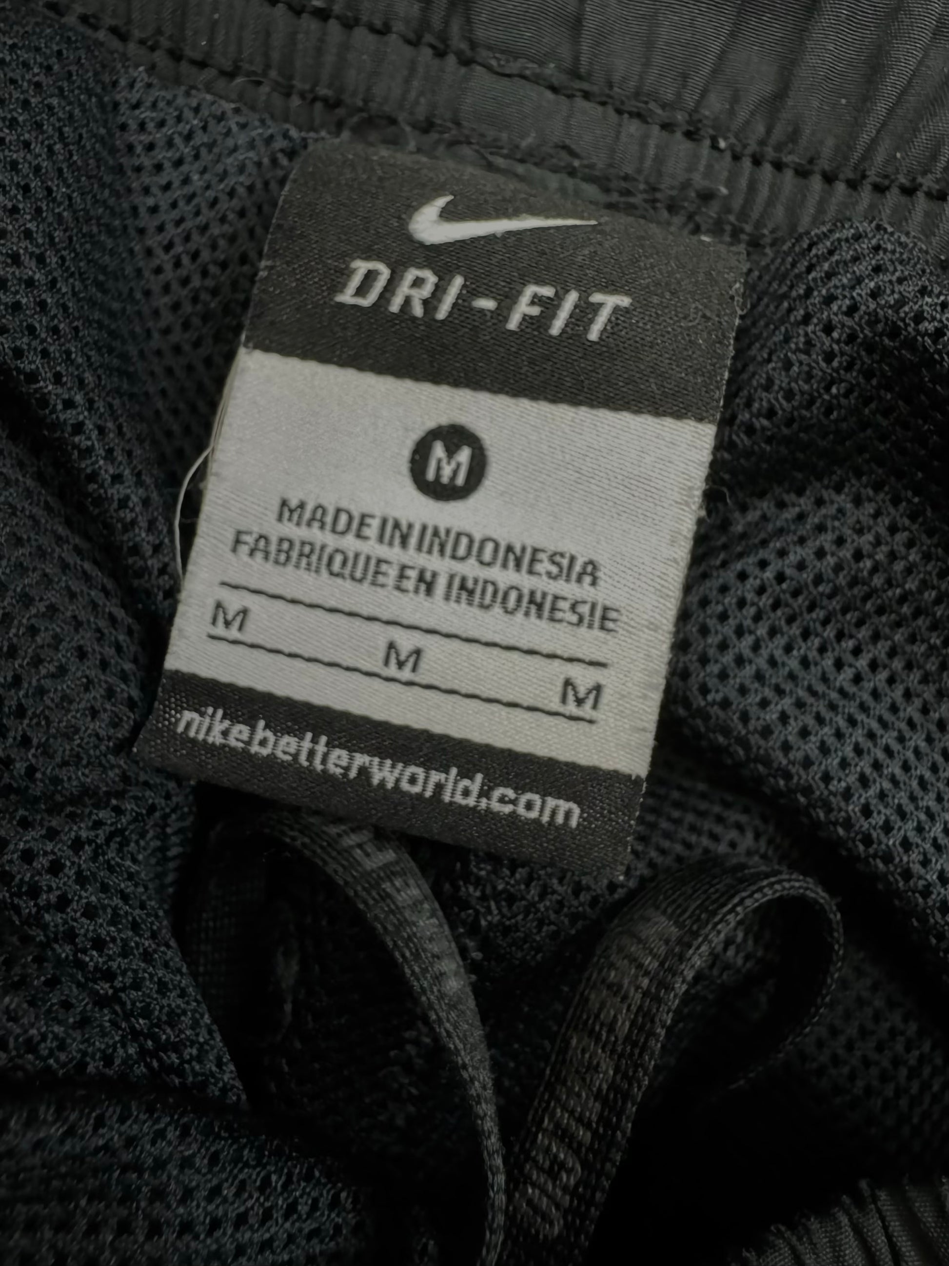 vintage Nike trackpants {M}