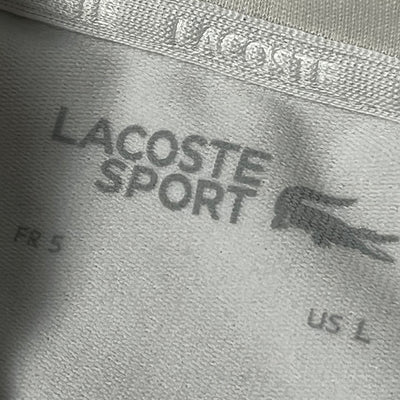 white Lacoste trackjacket {L}