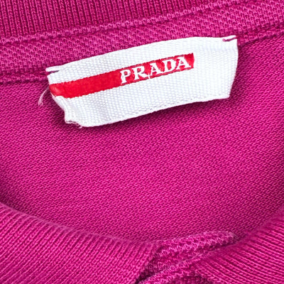 vintage pink Prada polo {M}