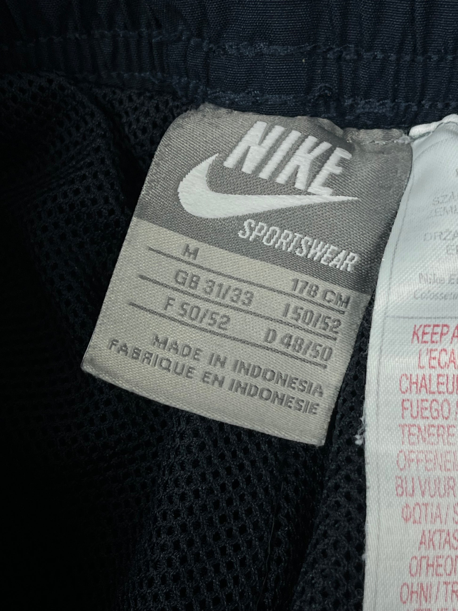 vintage Nike trackpants {M}