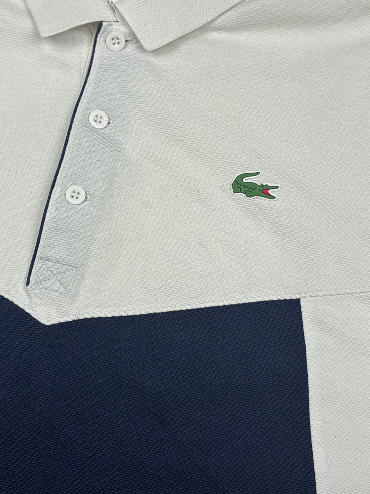 white Lacoste polo {M}