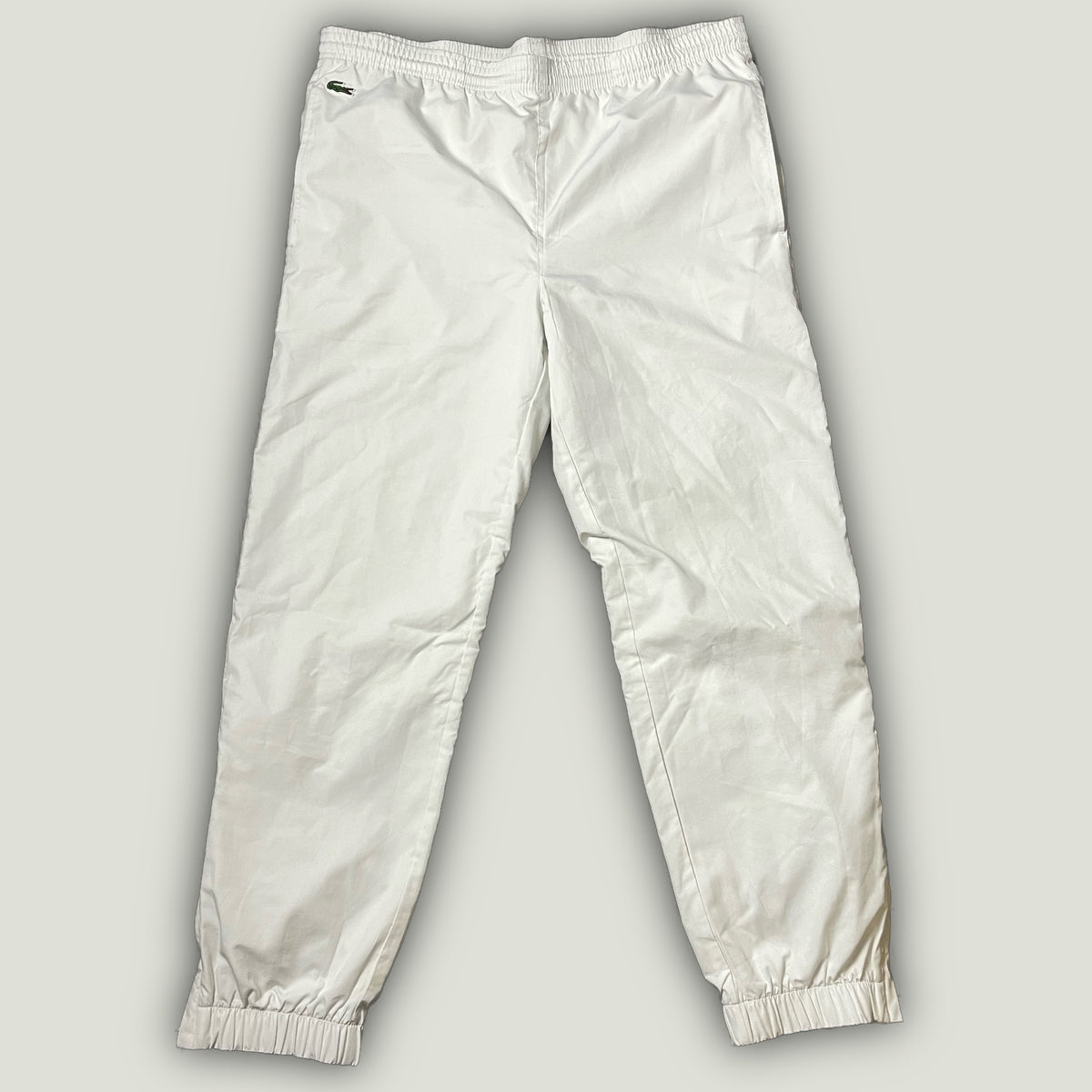 vintage white Lacoste trackpants {L}
