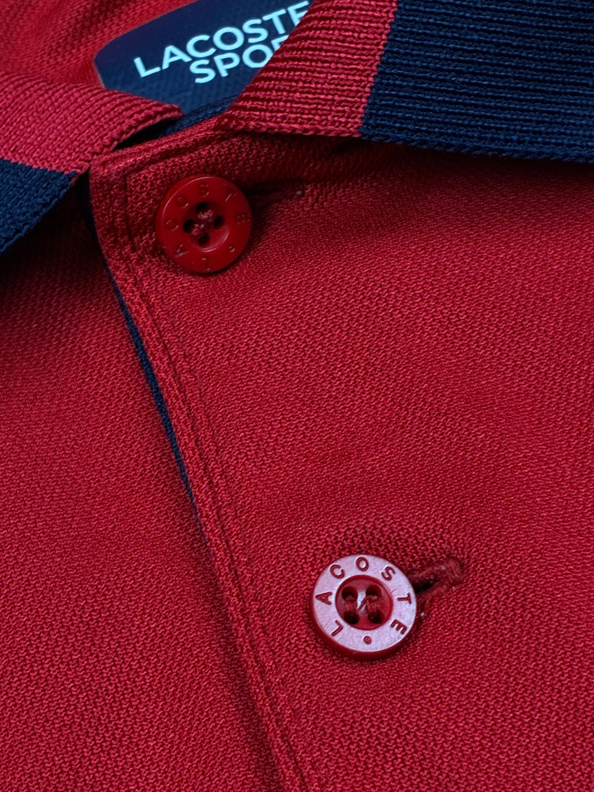 red Lacoste polo {XS}
