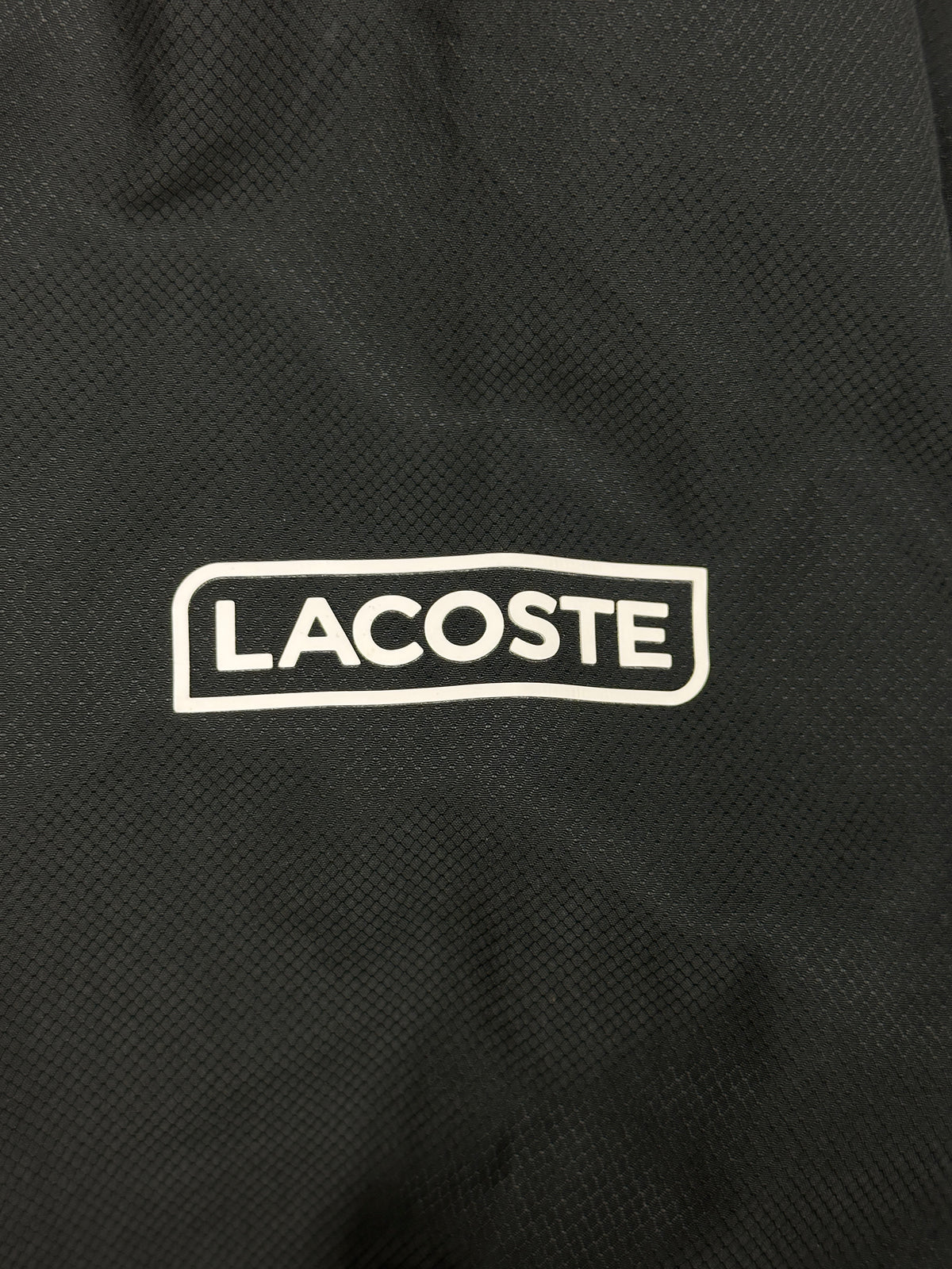 black Lacoste windbreaker {XS}