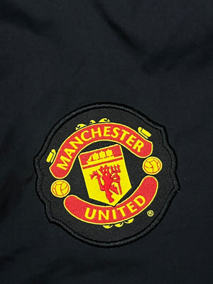 vintage Nike Manchester United trackpants {S}