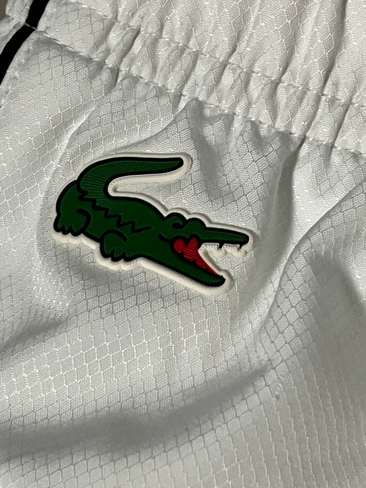 white/black Lacoste trackpants {L}