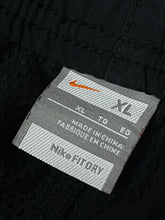 Load image into Gallery viewer, vintage Nike trackpants {XL}
