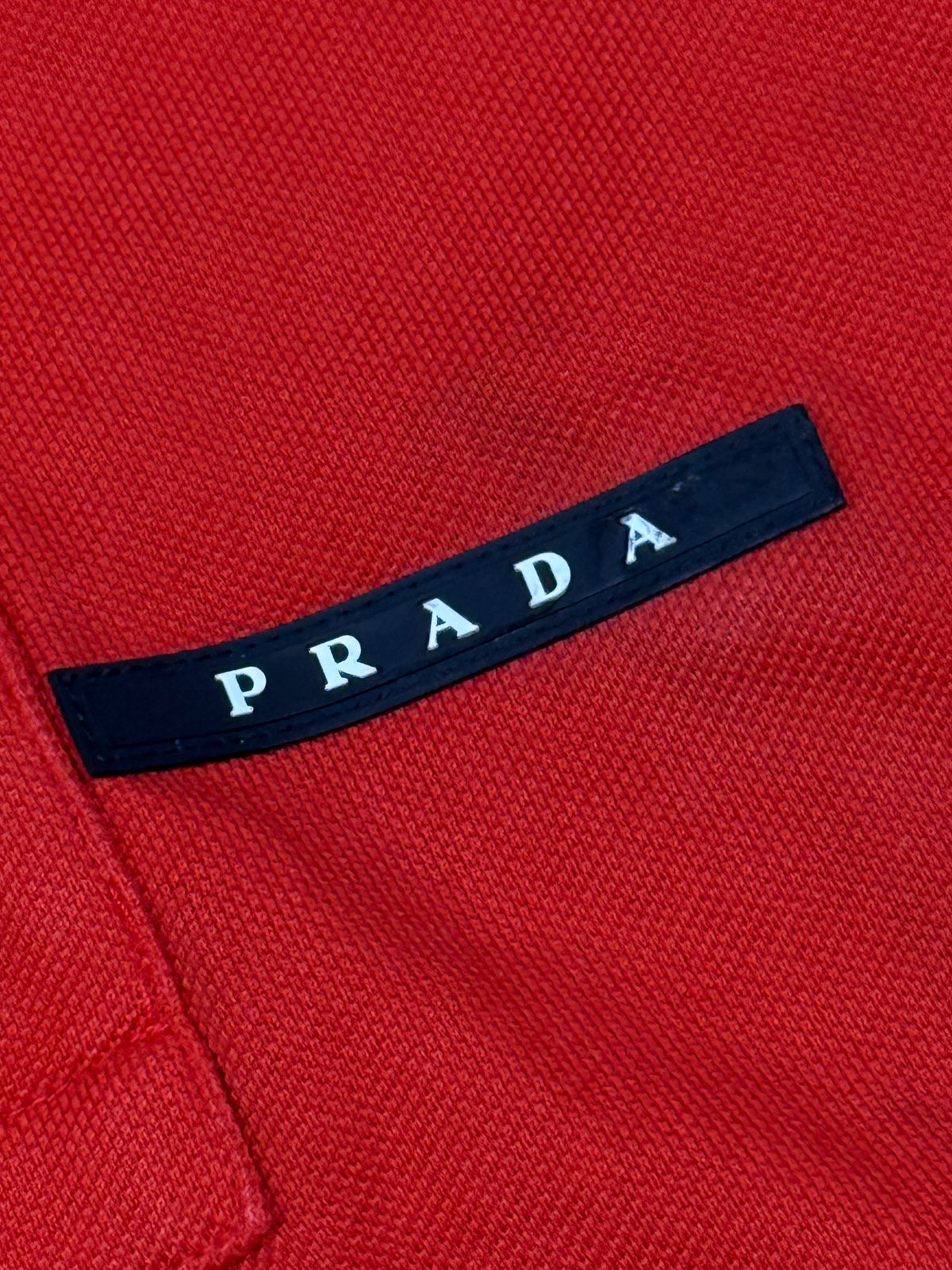 orange Prada polo