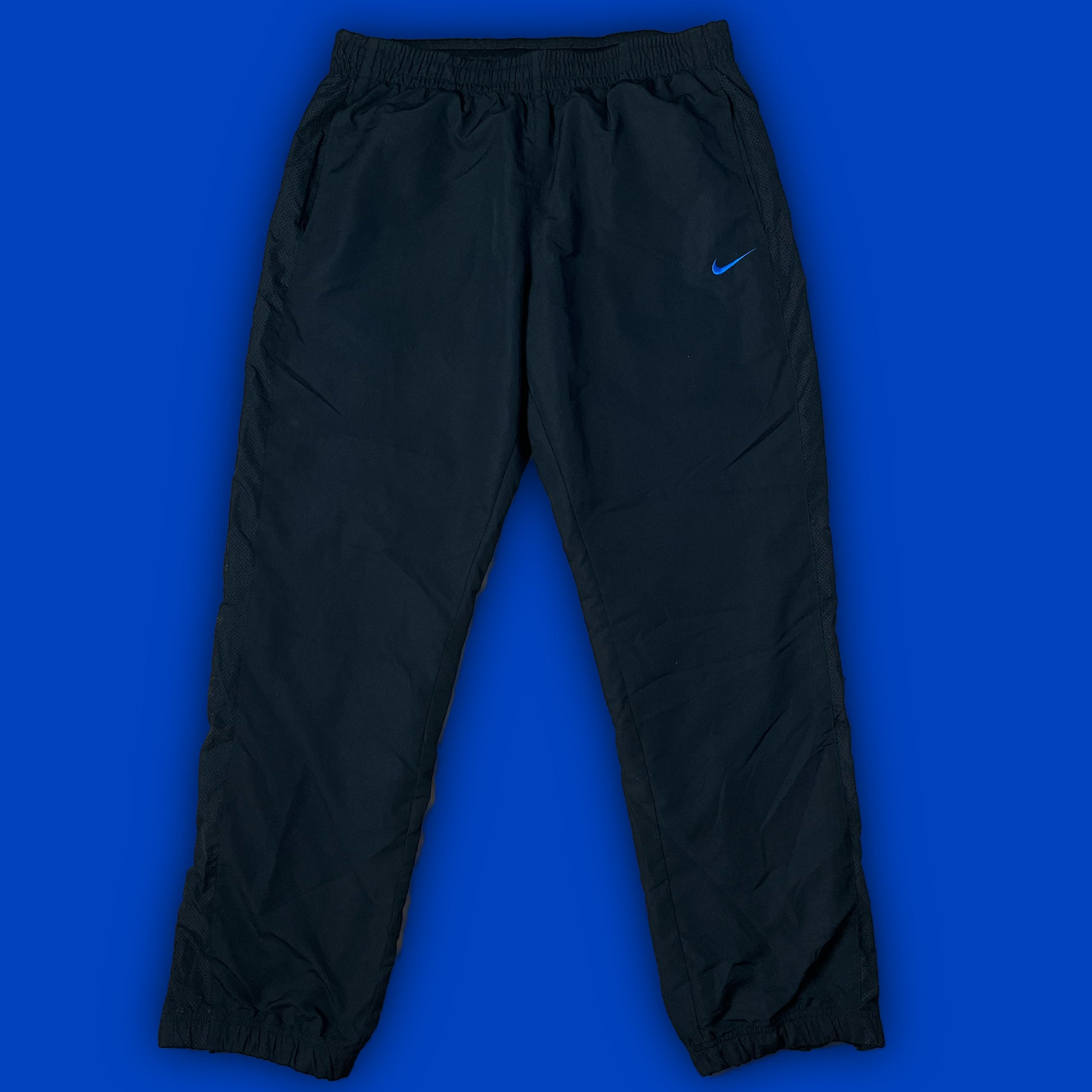 vintage Nike trackpants {L}