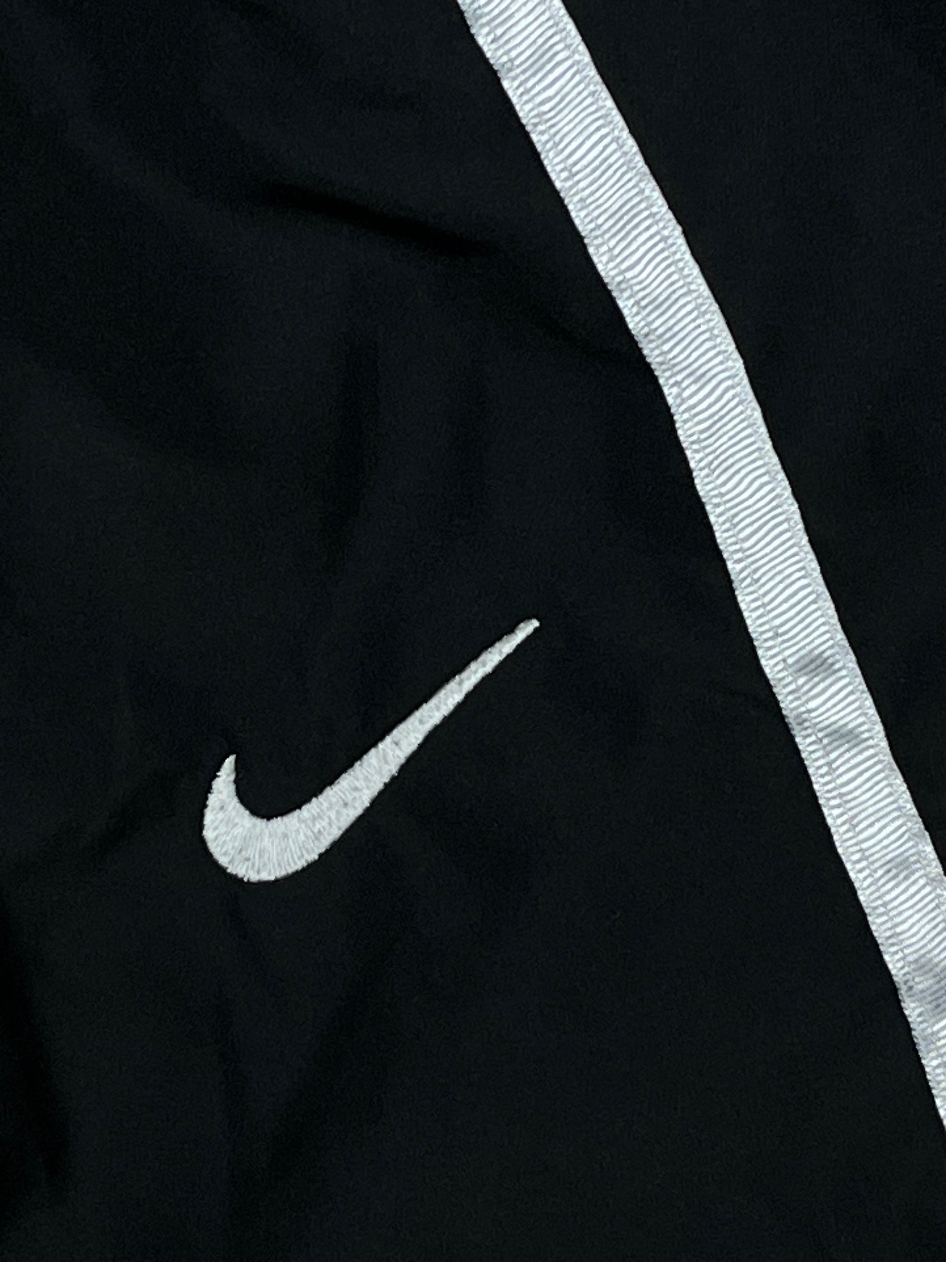 vintage Nike trackpants {S}