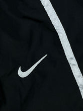 Load image into Gallery viewer, vintage Nike trackpants {S}
