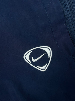 vintage Nike trackpants {L}