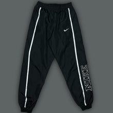 Load image into Gallery viewer, vintage Nike trackpants {S}
