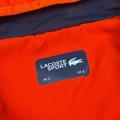 orange Lacoste windbreaker {S}