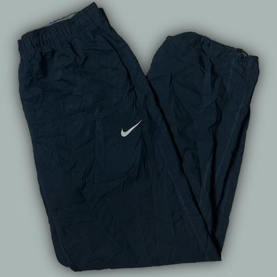 vintage Nike trackpants {M}