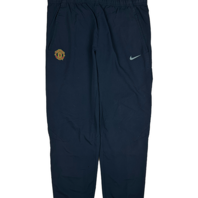 vintage Nike Manchester United trackpants {S}