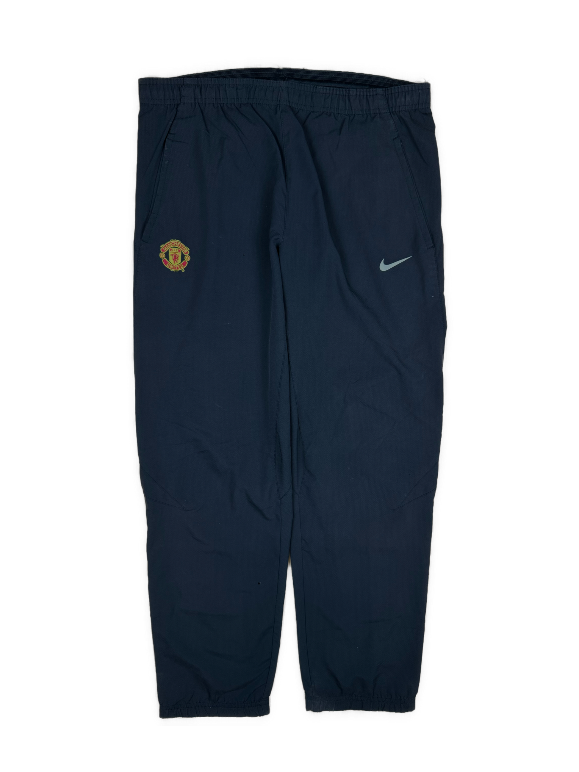 vintage Nike Manchester United trackpants {S}