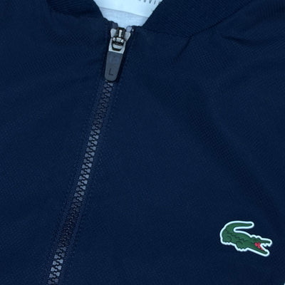 navyblue Lacoste windbreaker {S}