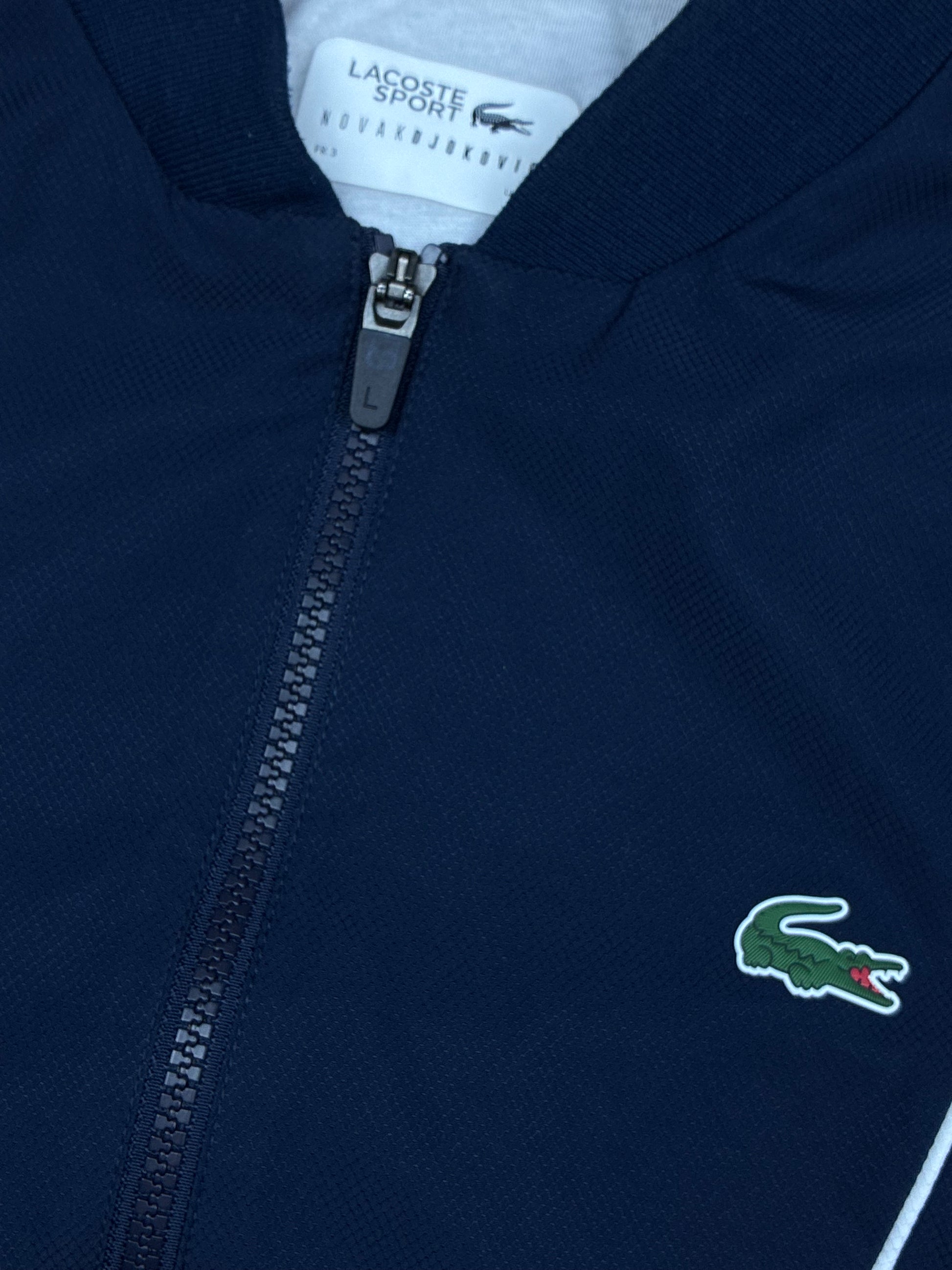 navyblue Lacoste windbreaker {S}