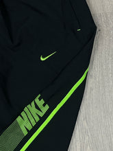 Load image into Gallery viewer, vintage Nike trackpants {L}
