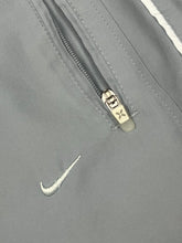 Load image into Gallery viewer, vintage Nike trackpants {S}
