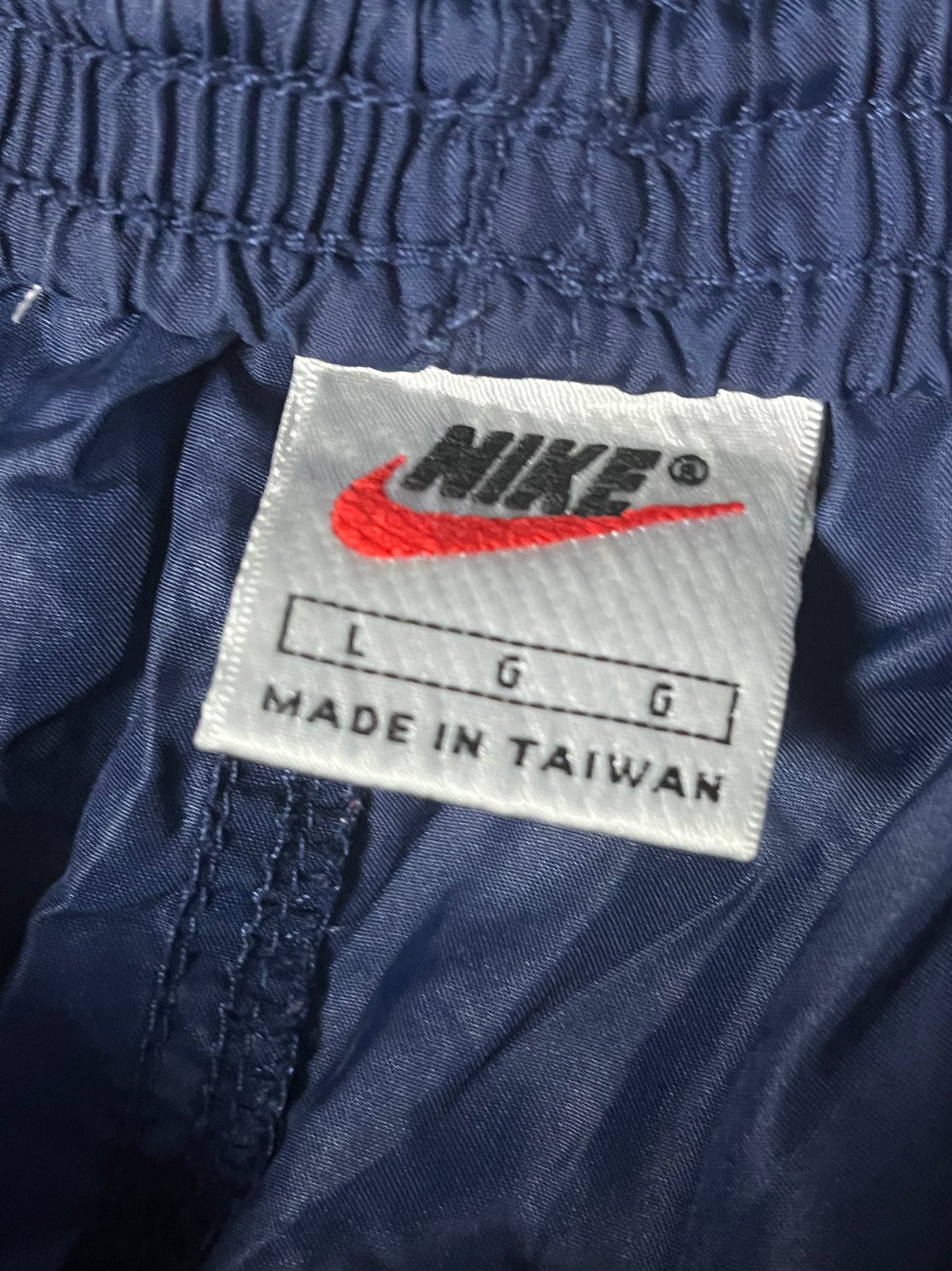 vintage Nike trackpants {L}