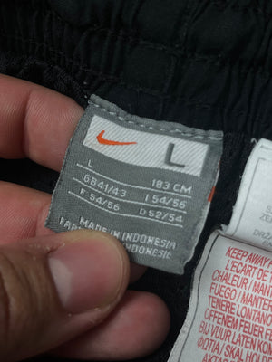 vintage Nike trackpants {L}