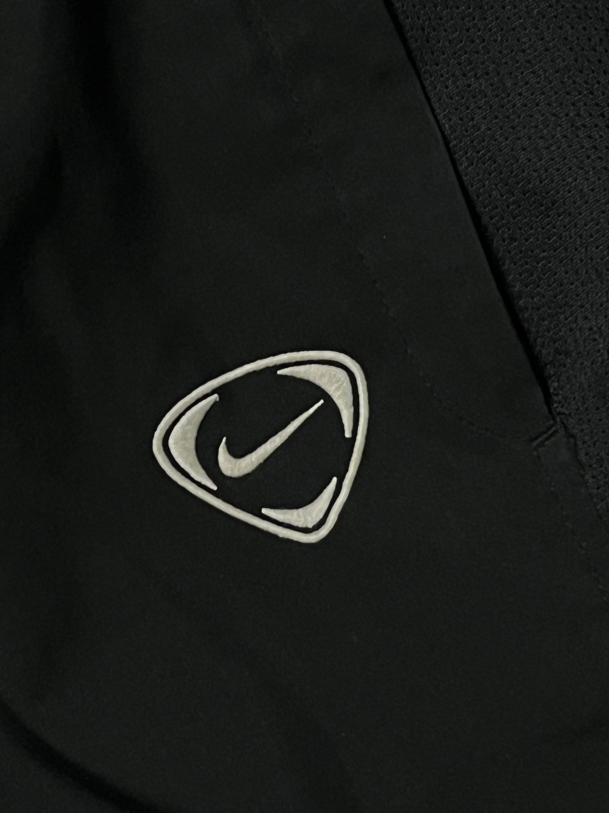 vintage Nike trackpants {L}