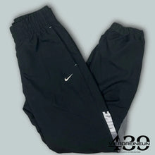 Load image into Gallery viewer, vintage Nike trackpants {S}
