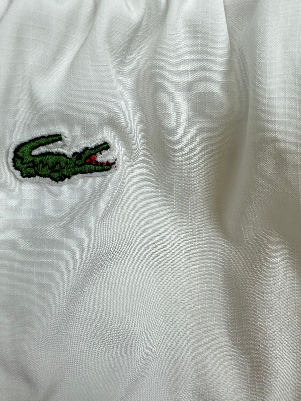 vintage Lacoste trackpants {S}