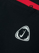 Cargar imagen en el visor de la galería, vintage Nike trackpants {L}
